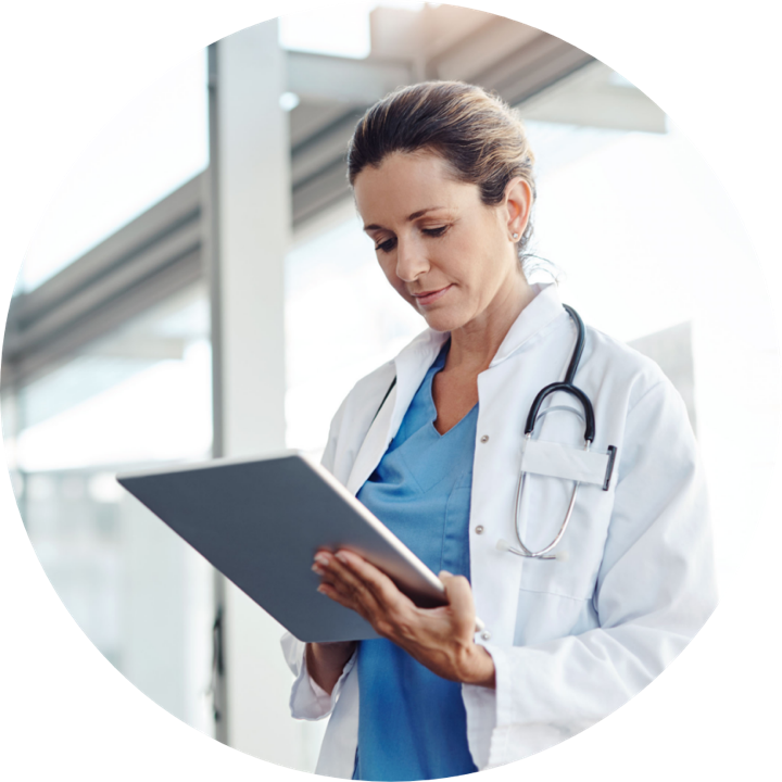 Pharmacist reviewing a tablet